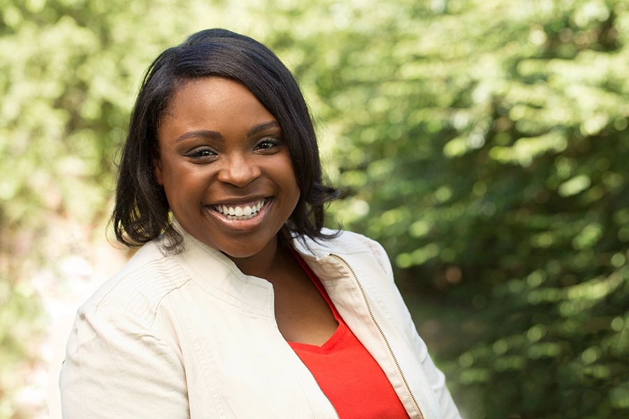 Blood-Sugar-Imbalance-Clinic A healthy, beautiful Black woman smiling outside. Schedule treatment for blood sugar imbalance from Dr. Stephanie King in Salt Lake City.