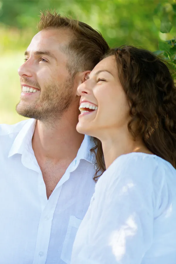 Immunotherapy-Treatment A happy couple looks up to the sky. Get treatment for immune support from Dr. Stephanie King in Salt Lake City.