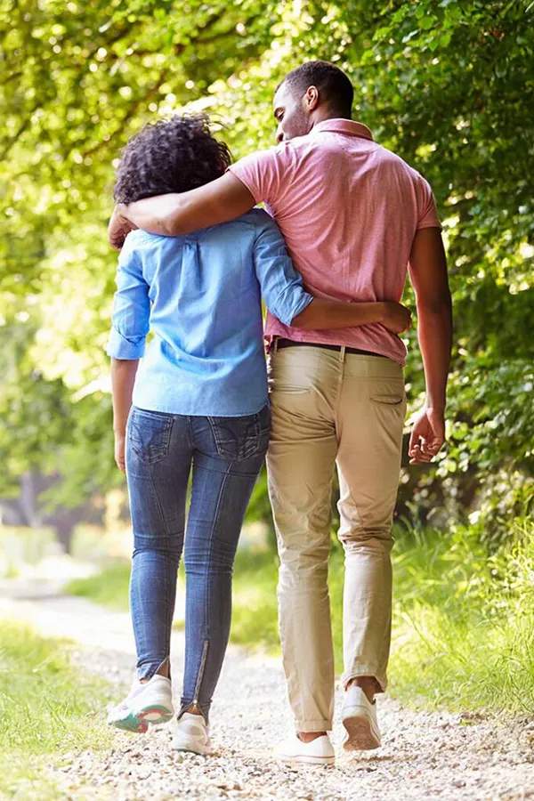 MOTS-c-Peptide-Treatment A healthy black couple take a nice stroll on a trail. Get MOTS-c Peptides for metabolism and weight loss from Dr. Stephanie King in Salt Lake City.