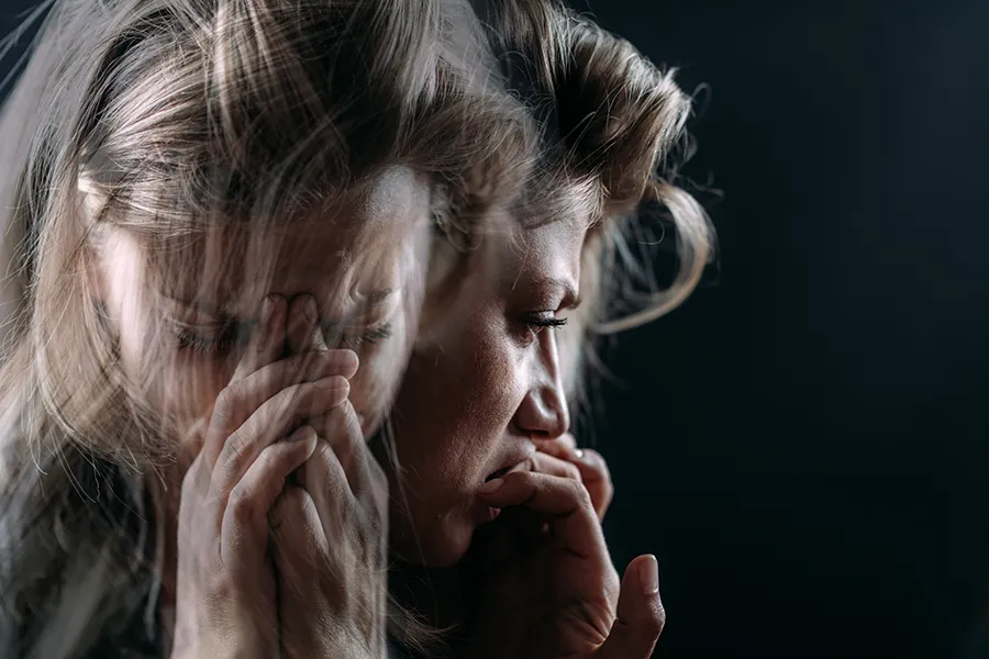 PTSD-Clinic Superimposed images of a woman with terrible worry. Schedule treatment for PTSD from Dr. Stephanie King in Salt Lake City.